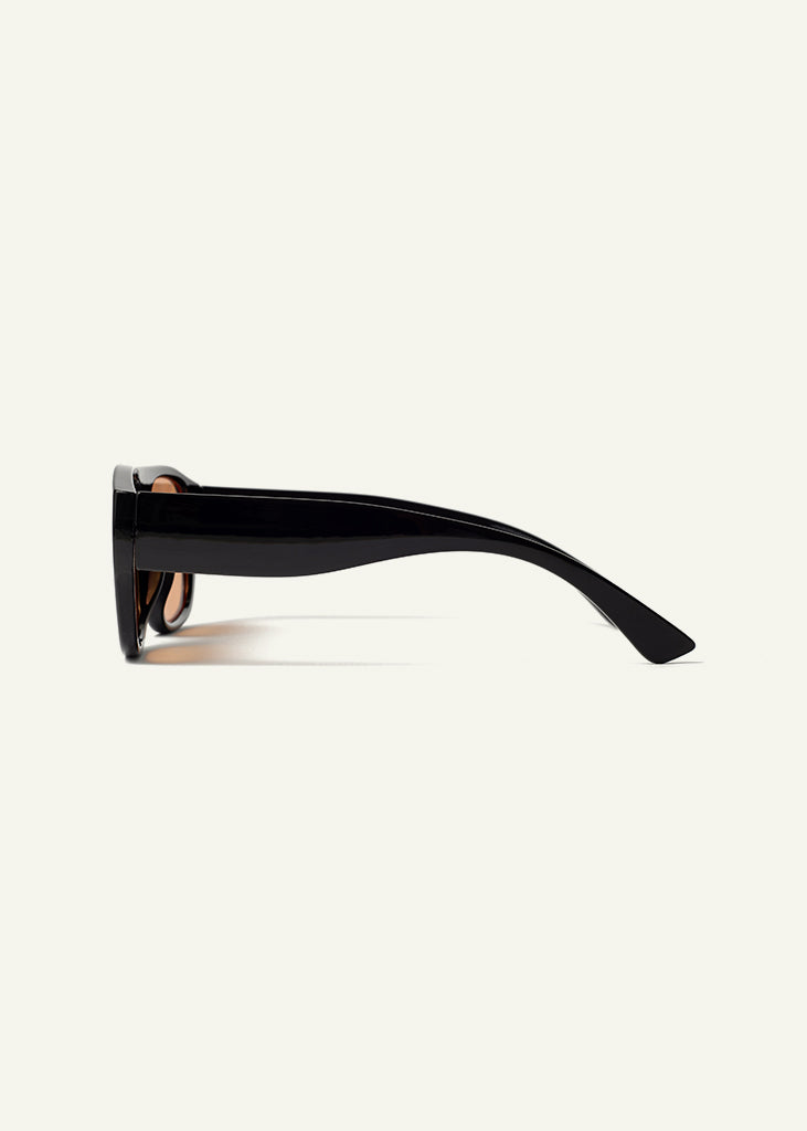 sybaria; sybaria sunglasses; BESANA sunglasses (BLACK & MANGO); Oversized; Oversized luxury; premium unisex eyewear; ultralight polycarbonate eyewear; Mango UV400 lenses; high fashion eyewear; chromotherapy eyewear;