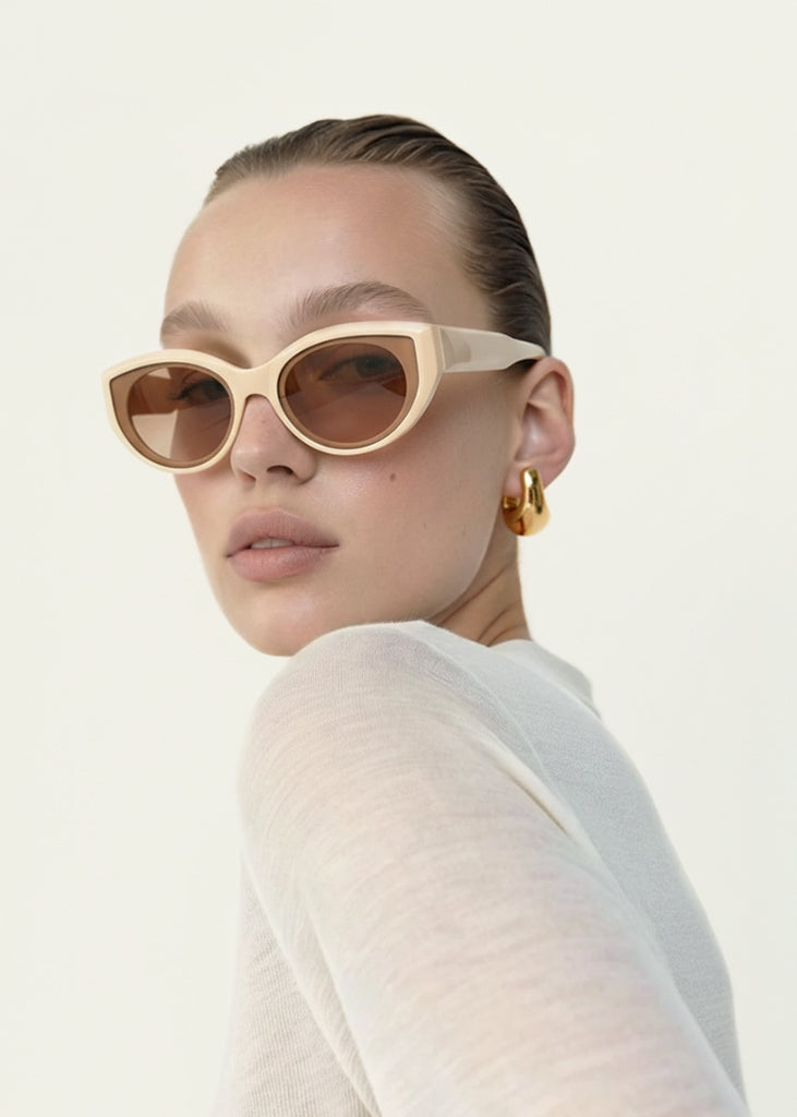 sybaria; sybaria sunglasses; AMALFI sunglasses (CREAM & AMBER); Cat eye; Luxury cat eye; premium unisex eyewear; ultra-lightweight polycarbonate eyewear; Amber UV400 lenses; high fashion eyewear; chromotherapy eyewear;