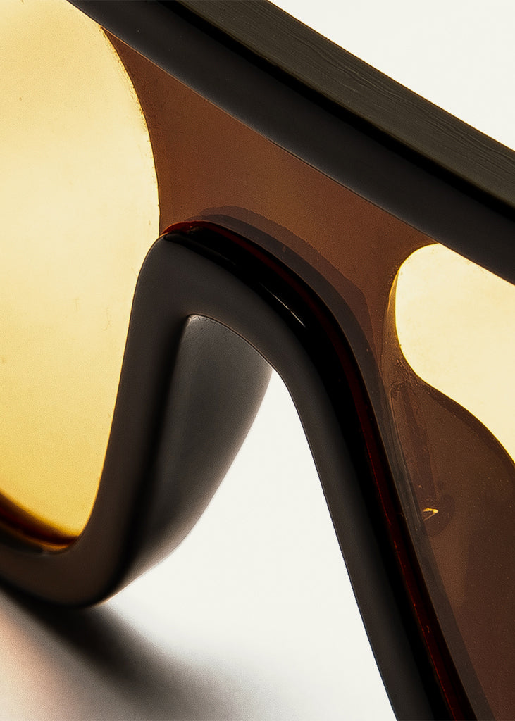 sybaria; sybaria sunglasses; BESANA sunglasses (BLACK & MANGO); Oversized; Oversized luxury; premium unisex eyewear; ultralight polycarbonate eyewear; Mango UV400 lenses; high fashion eyewear; chromotherapy eyewear;