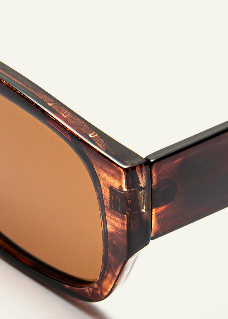 sybaria; sybaria sunglasses; BESANA (COFFEE) sunglasses; Oversized; Oversized luxury; premium unisex eyewear; ultralight polycarbonate eyewear; Coffee UV400 lenses; high fashion eyewear; chromotherapy eyewear;